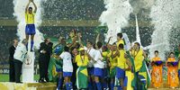 Brazil celebrate with the trophy after winning the 2002 Fifa World Cup in Yokohama, Japan