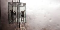 CHICAGO - JULY 01:  Visitors walk out on the Ledge, a new glass cube that juts out from the 103rd floor Skydeck of the Sears Tower, during a media preview July 1, 2009 in Chicago, Illinois. The 1,353 foot high observatory will open to the public tomorrow.  (Photo by Scott Olson/Getty Images)