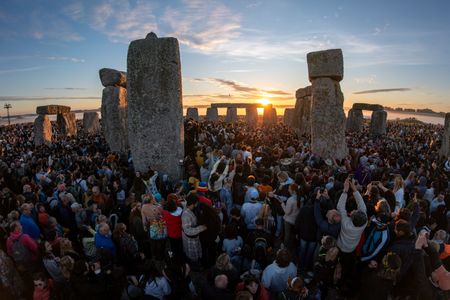 Where the sun stands still, solstice crowds gather at stonehenge