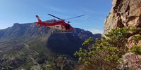 WSAR, AMS, & TMNP rangers combining to evacuate an injured hiker on Lion's Head after a serious fall. Photographer: Barry Washkansky