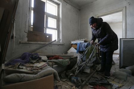 One killed as Ukraine accuses Russian forces of heavy shelling in east