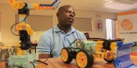 Teacher Gabriel Moeng is seen at the Artificial Intelligence Lab next to AI robotics at Moses Kotane Primary in Braamfischer, Soweto. (Photo: Nhlanhla Phillips)