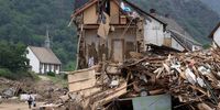 epa09619035 An collapsed houses after heavy flooding of the river Ahr, in Altenahr, Germany, 19 July 2021. Large parts of western Germany and central Europe were hit by flash floods in the night of 14 to 15 July, following days of continuous rain that destroyed buildings and swept away cars. The total number of victims in the flood disaster in western Germany rises to at least 164, with many hundreds still missing.  EPA-EFE/FRIEDEMANN VOGEL