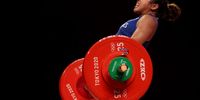 Hidilyn Diaz of Team Philippines competes during the Weightlifting - Women's 55kg Group A on day three of the Tokyo 2020 Olympic Games at Tokyo International Forum on July 26, 2021 in Tokyo, Japan. (Photo by Chris Graythen/Getty Images)