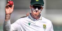 Simon Harmer of South Africa waves the ball after taking six wickets during day four of the Second Test in the series between Pakistan and South Africa at Rawalpindi Cricket Stadium on October 23, 2025 in Rawalpindi, Pakistan. (Photo: Sameer Ali / Getty Images)
