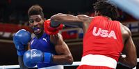 TOKYO, JAPAN - AUGUST 08: Andy Cruz of Team Cuba dodges a punch from Keyshawn Davis of Team United States during the Men's Light (57-63kg) Final bout between Keyshawn Davis of Team United States and Andy Cruz of Team Cuba on day sixteen of the Tokyo 2020 Olympic games at Kokugikan Arena on August 08, 2021 in Tokyo, Japan. (Photo by Buda Mendes/Getty Images)