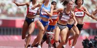 TOKYO, JAPAN - AUGUST 02: Edinah Jebitok of Team Kenya falls, tripping Sifan Hassan of Team Netherlands, in round one of the Women's 1500m heats on day ten of the Tokyo 2020 Olympic Games at Olympic Stadium on August 02, 2021 in Tokyo, Japan. (Photo by Michael Steele/Getty Images)