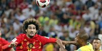  Fernandinho of Brazil (R) and Marouane Fellaini of Belgium in action during the FIFA World Cup 2018 quarter final soccer match between Brazil and Belgium in Kazan, Russia, 06 July 2018.   EPA-EFE/SERGEY DOLZHENKO