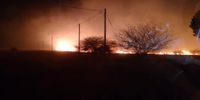 North West farmers and volunteers fight veld fires that burnt Kumbagana and moved to Zuurplaat, burning structures and injuring volunteers. (Photo: Supplied)