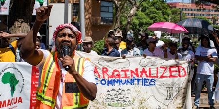 ‘Nothing about us, without us,’ mining-affected communities demand in protest outside DMRE offices