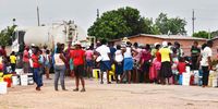Magwegwe residents line up to fetch water from a Bulawayo City Council bowser as shortages of water increase in the city. (Photo: Darlington Mwashita)