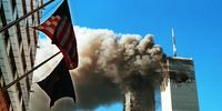 394261 09: Smoke Pours From The World Trade Center After Being Hit By Two Planes September 11, 2001 In New York City.  (Photo By Craig Allen/Getty Images)