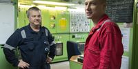 From left: Third engineer Oleksyi Kyzyma and chief engineer Oleksandr Skorobagatko in the engine control room. (Photo: Matrix Images / Nic Bothma)