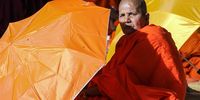 A Sri Lankan Buddhist devotee takes part in a religious observance on a full moon day at a temple in the Kelaniya suburb of Colombo, Sri Lanka, 05 April 2023. Buddhism is the official religion of the South Asian island nation and the majority of the island's population traditionally engages in religious observances on full moon days.  EPA-EFE/CHAMILA KARUNARATHNE