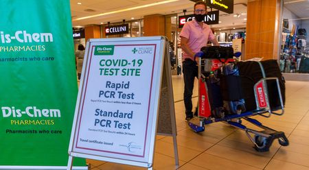 Omicron variant doubles in UK; South Africa registers 18,035 new cases