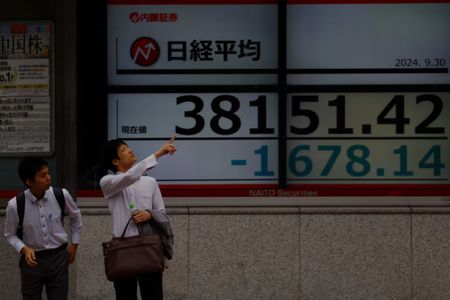 Asian shares slide on US curbs on China, euro gives up gains