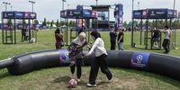 Two women play football during the UEFA Champions Festival at the Yenikapi event area in Istanbul, Turkey, 08 June 2023. Manchester City will play Inter Milan in the UEFA Champions League final at the Ataturk Olympic Stadium in Istanbul on 10 June 2023.  EPA-EFE/ERDEM SAHIN