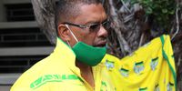 Regional executive committee member for the ANC, Delmaine Cottee, outside the Cape Town Civic Centre voting station, on 9 December 2020 (Photo: Victoria O’Regan).