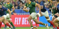Damian De Allende of South Africa breaks the line against France during the 2023 Rugby World Cup. (Photo: Lionel Hahn/Getty Images)