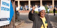 Johanna Kgoma, 50, celebrated after voting in Alexandra during the 2019 elections. (Photo: Greg Nicolson)