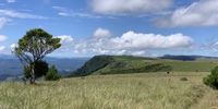 Barberton Valley created by an asteroid strike 3,000,000,000 years ago, and Adam's Calendar in the distance. (Mpumalanga).