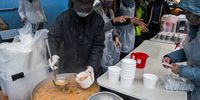 A group of volunteers prepares to give soup to homeless people at the Hope Exchange. Everyone coming to collect has to wear masks and have their hands sanitised at the entrance. If they don’t have a mask, one is given to them.  (Photo: Ashraf Hendricks)