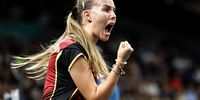 Annett Kaufmann of Germany celebrates winning against Rachel Sung of USA during the Women Team Round of 16 Match between USA and Germany of the Table Tennis competitions in the Paris 2024 Olympic Games, at The South Paris Arena in Paris, France, 06 August 2024.  EPA-EFE/RITCHIE B. TONGO