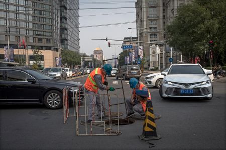 11 dead, dozens hurt as driver rams into crowd in China