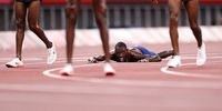 TOKYO, JAPAN - AUGUST 06: Paul Chelimo of Team USA reacts after winning bronze during the Men's 5000 metres final day fourteen of the Tokyo 2020 Olympic Games at Olympic Stadium on August 06, 2021 in Tokyo, Japan. (Photo by David Ramos/Getty Images)