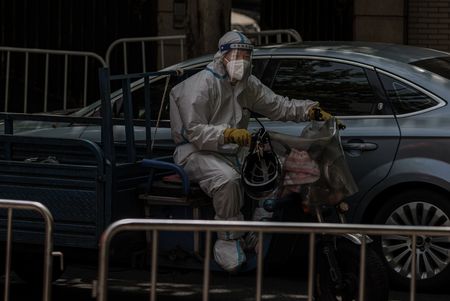 Nerves fray, frustration grows in Shanghai's lockdown purgatory