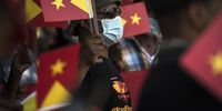 A man is surrounded by Tigrayan flags. (Photo: Shiraaz Mohamed)