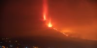 epaselect epa09512554 View of the Cumbre Vieja volcano eruption in La Palma early 08 October 2021. La Palma's airport closed the previous day due to the ashes from the volcano's eruption.  EPA-EFE/Carlos de Saa