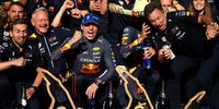 SPA, BELGIUM - AUGUST 28: Race winner Max Verstappen of the Netherlands and Oracle Red Bull Racing and Second placed Sergio Perez of Mexico and Oracle Red Bull Racing celebrate with their team after the F1 Grand Prix of Belgium at Circuit de Spa-Francorchamps on August 28, 2022 in Spa, Belgium. (Photo by Dan Mullan/Getty Images)