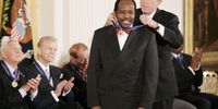 President George W Bush awards the Presidential Medal of Freedom to Rwandan hotelier Paul Rusesabagina, who protected people at a hotel he managed during the 1994 Rwandan genocide, during a ceremony in the East Room of the White House in Washington, DC Wednesday 09 November 2005. The awards honorees, the country's highest civilian honor, includes entertainers, athletes, authors and a Rwandan hotelier.  EPA/SHAWN THEW