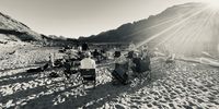Chilling on riverbank before paddling the Orange River, Namibia. Photographer: Kim Wolstenholme