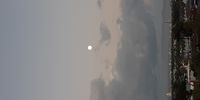 Soft sunrise hue on moon setting over Strand. Image: Lynn C 