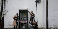 A mural by Banksy around a phone box in Cheltenham, the home of GCHQ, Britain’s signals intelligence agency. (Photo: Flickr)