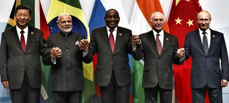 Leaders back off strong condemnation of rising protectionism