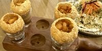 Pani puri at Punjab. The 'shot' is a part of this street food speciality. (Photo: Tony Jackman)