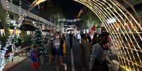 Visitors at Melrose Arch in Johannesburg, South Africa. The whole precinct is lit up by fairies, a giant teddy bear, stars, lights and a reindeer. (Photo: Shiraaz Mohamed)