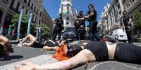 epa09247187 Extinction Rebellion activists protest at Gran Via in dowtown Madrid to demand that 'ecocide' (serious damage to a territory's ecosystems) be recognized as an international crime, in Madrid, Spain, 04 June 2021.  EPA-EFE/RODRIGO JIMENEZ