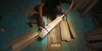 A labourer works in a GR8 cricket bat manufacturing unit in Sangam, some 38 kilometers south of Srinagar, the summer capital of Indian Kashmir, 12 June 2023. Kashmir's bat manufacturers have received an order for bats to be used during the 2023 One Day International (ODI) World Cup; they even earlier have had an order for 10 bats for the Twenty20 (T20) World Cup in 2022. Only two types of bats are used in cricket around the world - English Willow and Kashmiri Willow - and while the prices of English Willow are many times higher than those made of Kashmir Willow and are more often used by players, the Kashmiri Willow has lately started to get more popular among cricketers.  EPA-EFE/FAROOQ KHAN  ATTENTION: This Image is part of a PHOTO SET