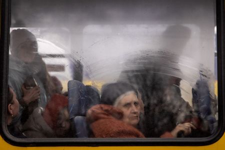 Exhausted evacuees from Mariupol steel plant reach safety in Ukrainian city