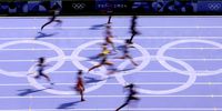 Runners comepete in the Women 100m Round 1 heats in the Athletics competitions in the Paris 2024 Olympic Games, at the Stade de France stadium in Saint Denis, France, 02 August 2024.  EPA-EFE/YOAN VALAT