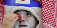 epaselect epa10350129 Supporter of Japan reacts after losing the penalty shoot-out of the FIFA World Cup 2022 round of 16 soccer match between Japan and Croatia at Al Janoub Stadium in Al Wakrah, Qatar, 05 December 2022.  EPA-EFE/Abir Sultan