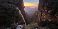 Watching the day break from the top of Cleopatra’s Fall in the Wolkberg. Photographer: Marietjie Louw