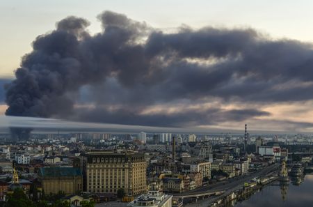 Russian attack on Kyiv kills three, hits apartments, other buildings