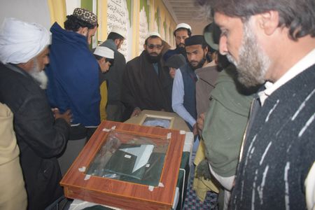 Pakistan sends helicopters, drones to end desert standoff; 58 dead