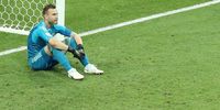 Goalkeeper Igor Akinfeev of Russia reacts after the FIFA World Cup 2018 quarter final soccer match between Russia and Croatia in Sochi, Russia, 07 July 2018. Russia lost on penalties 3-4. EPA-EFE/KHALED ELFIQI 