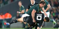 The tackle that rocked the world: Bismarck du Plessis smashes All Blacks flyhalf Dan Carter, which led to a yellow card for the hooker, despite it being an entirely legal hit. (Photo: Sandra Mu / Getty Images)